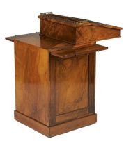 A mid Victorian walnut davenport, C Hindley & Sons, London