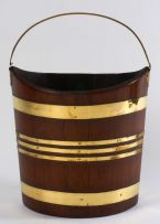 A George III mahogany and brass-bound bucket