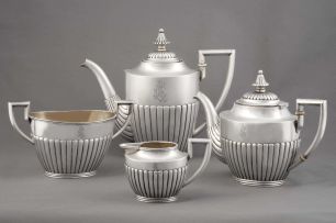 A Fabergé silver four-piece tea and coffee set, with marks for Fabergé, Moscow, 1908 - 1926
