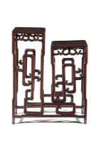 A Chinese hardwood two-tiered stand, late 19th century
