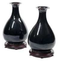 A pair of Chinese mirror black-glazed vases, modern