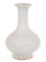 A Chinese white craquelure-glazed stoneware vase, Qing Dynasty, 18th century
