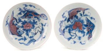 A pair of Chinese copper-red, underglaze-blue and celadon-glazed dishes, Qing Dynasty, 19th century