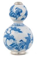 A blue and white faience double-gourd vase, 18th century