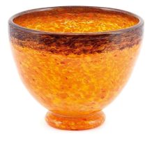 A mottled orange and brown glass bowl