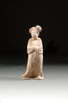 A Chinese painted pottery figure of a court lady, Tang Dynasty