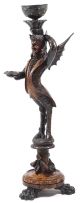 A walnut centre stand carved in the figure of a satyr, probably Italian, late 19th century