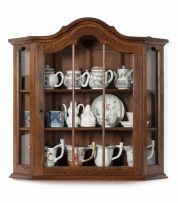 A Dutch oak hanging display cabinet, early 20th century