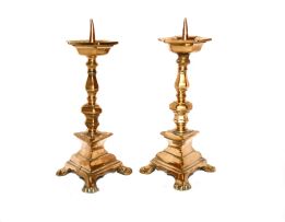 A pair of brass pricket candlesticks, 19th century
