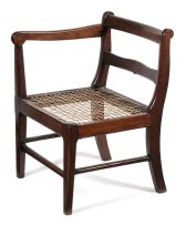 A rare Cape stinkwood Court Martial armchair, 19th century