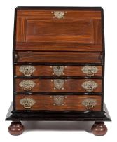 An Anglo Indian rosewood and ebony brass-mounted fall-front bureau, 19th century