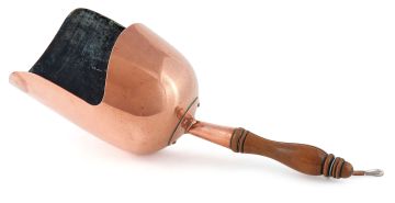A copper grain shovel