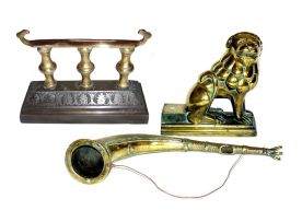 A brass ornamental horn