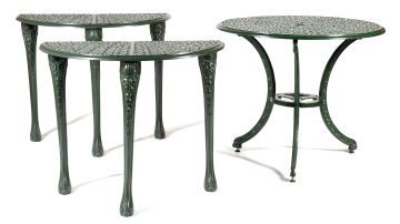 A green-painted wrought iron circular table
