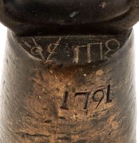 A VOC brass weight, 1791