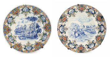 A pair of Dutch Delft blue and white and polychrome enamel dishes, 19th century