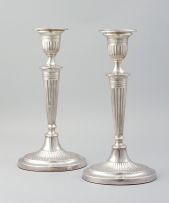 A pair of Edward VII silver candlesticks, H Matthews, Birmingham, 1908