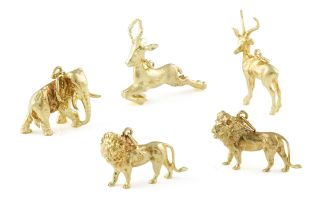 Five gold wild animal charms