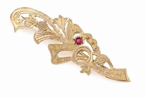 Indian gold and red stone brooch