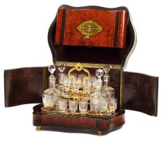 A French amboyna and ebony brass-mounted travelling liqueur cabinet, 1860s