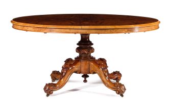 A Victorian walnut oval centre table
