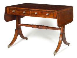 A Regency rosewood and brass inlaid sofa table