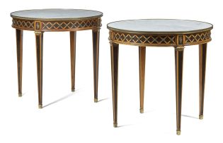 A pair of satinwood and ebonised brass-mounted marble-topped gueridon tables