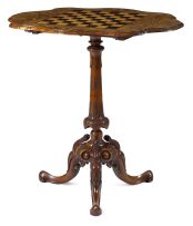A Victorian walnut and inlaid games table
