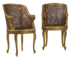 A pair of French giltwood and caned bergères, late 19th century