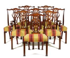 A set of six George III style mahogany dining chairs and a pair of carvers, early 20th century