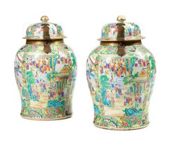 A pair of Chinese Canton Famille-Rose brass-mounted baluster temple jars, Qing Dynasty, 19th century