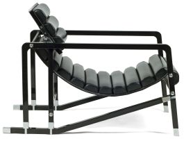 A chrome-metal mounted lacquered-wood and leather-upholstered 'Transat' armchair, originally designed by Eileen Gray (1926-1930)