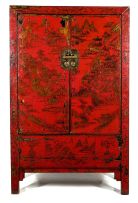 A Chinese red lacquer, Northern elm and willow cupboard, Qing Dynasty, 18th century