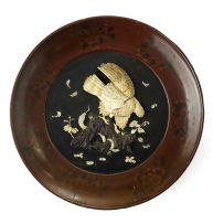 A Japanese black lacquer, ivory and mother-of-pearl plaque, late Meiji Period (1868-1912)