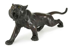 A Japanese bronze figure of a tiger, Meiji Period (1868-1912) in the style of Genryusai Seiya and signed Tsunemitsu