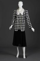 A black and white printed houndstooth check jacket