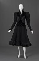 An embroided and quilted black velvet and slik taffeta cocktail dress