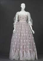 A wedding gown in chantilly lace over pink regency striped acetate taffeta