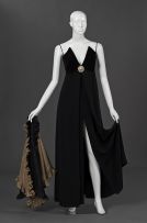A soft flowing black empire cut evening gown