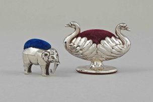 A Victorian novelty double swan silver pin cushion, Hilliard and Thomason, Chester, 1898