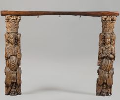 A pair of European carved oak figural pilasters, possibly 17th century