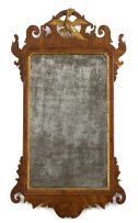 A George III style mahogany and parcel gilt mirror, late 19th/early 20th century