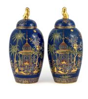 A pair of Carlton Ware 'Persian' vases and covers, Wiltshaw & Robinson, circa 1925