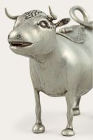 A silver cow creamer in the manner of John Schuppe, early 20th century