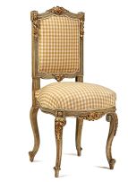 A pair of French painted and parcel-gilt side chairs