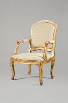 A Louis XV style giltwood and upholstered armchair, 19th century