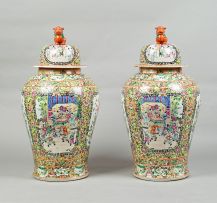A pair of Chinese Famille-Rose jars and covers