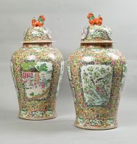 A pair of Chinese Famille-Rose jars and covers