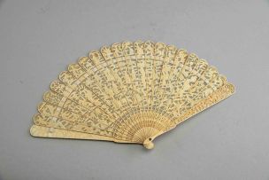 A Chinese Canton carved and pierced ivory brisé fan, Qing Dynasty, 19th century