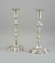 A pair of George III cast silver candlesticks, Ebenezer Coker, London, 1764